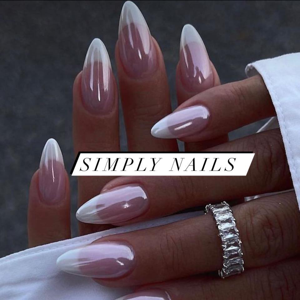 Elegant nail art design featuring intricate patterns and colors